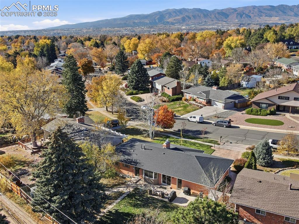 Image 40 of 47: Back of the home from the air