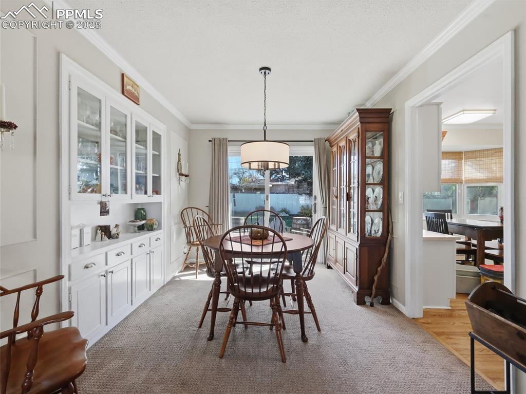 Image 9 of 47: Dining area with built in China cabinet