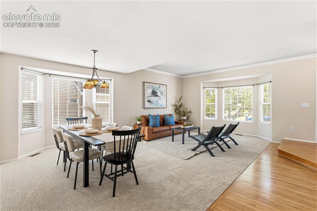 Image 8 of 50: Dining & living rooms