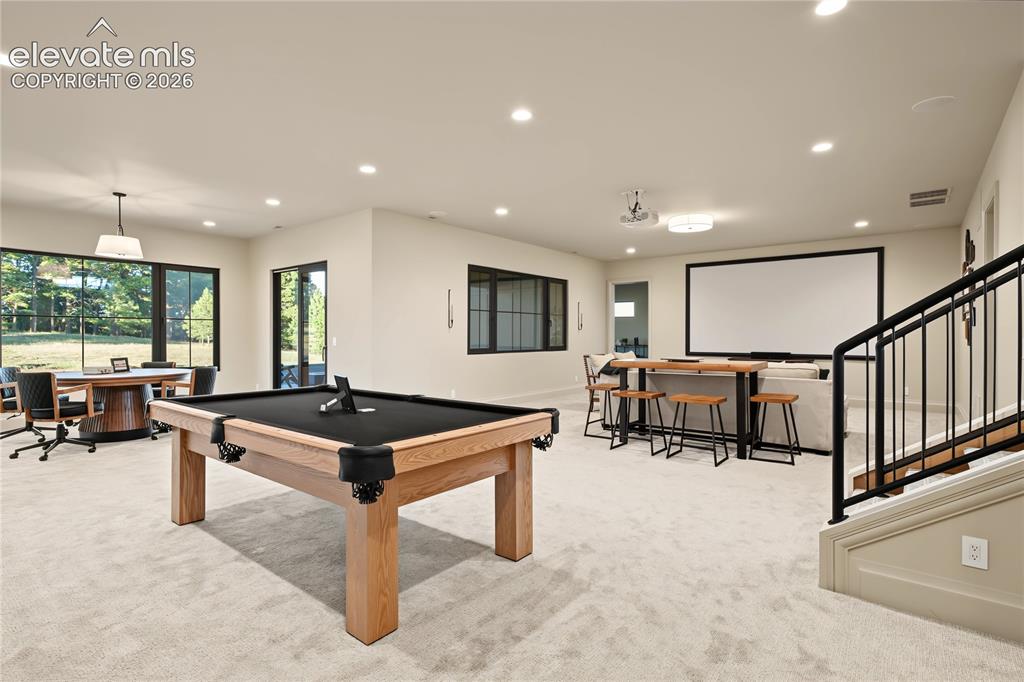 Image 31 of 50: Enjoy this large open Rec room