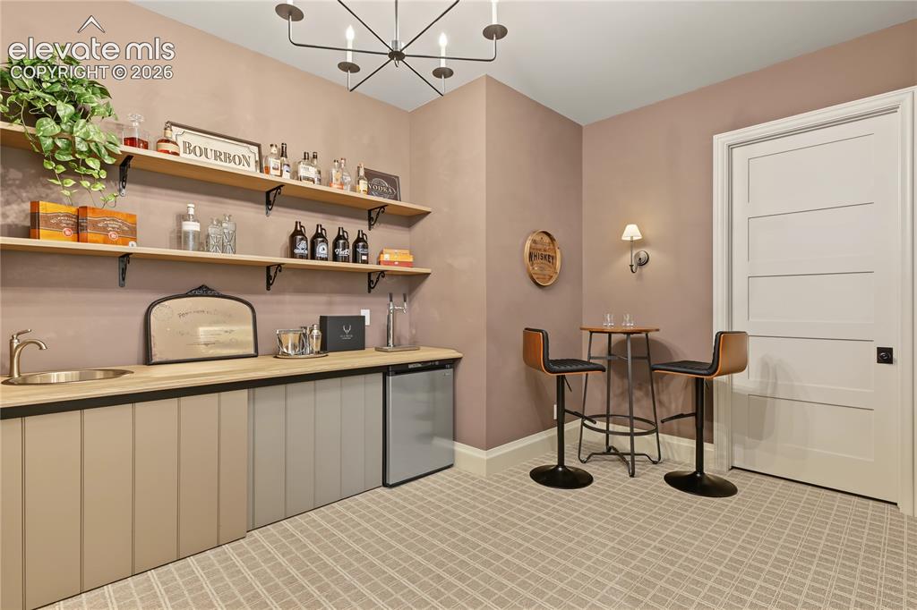 Image 39 of 50: This Speak Easy room is a great getaway comes with your own kegerator in th