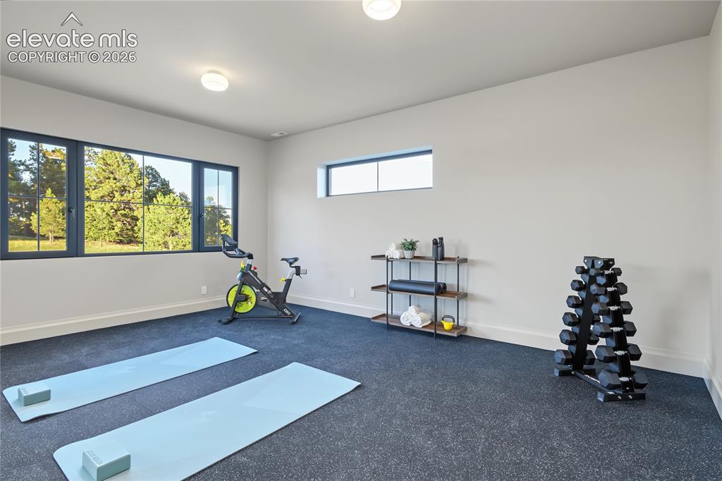 Image 40 of 50: Bonus room currently being used as a excercise room.
