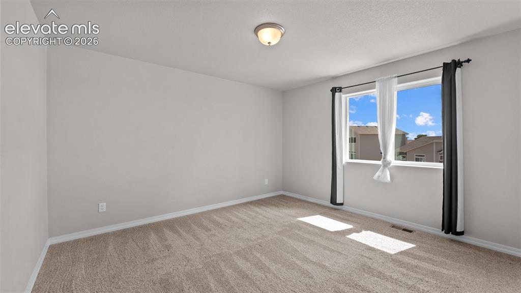 Image 15 of 29: Master Bedroom