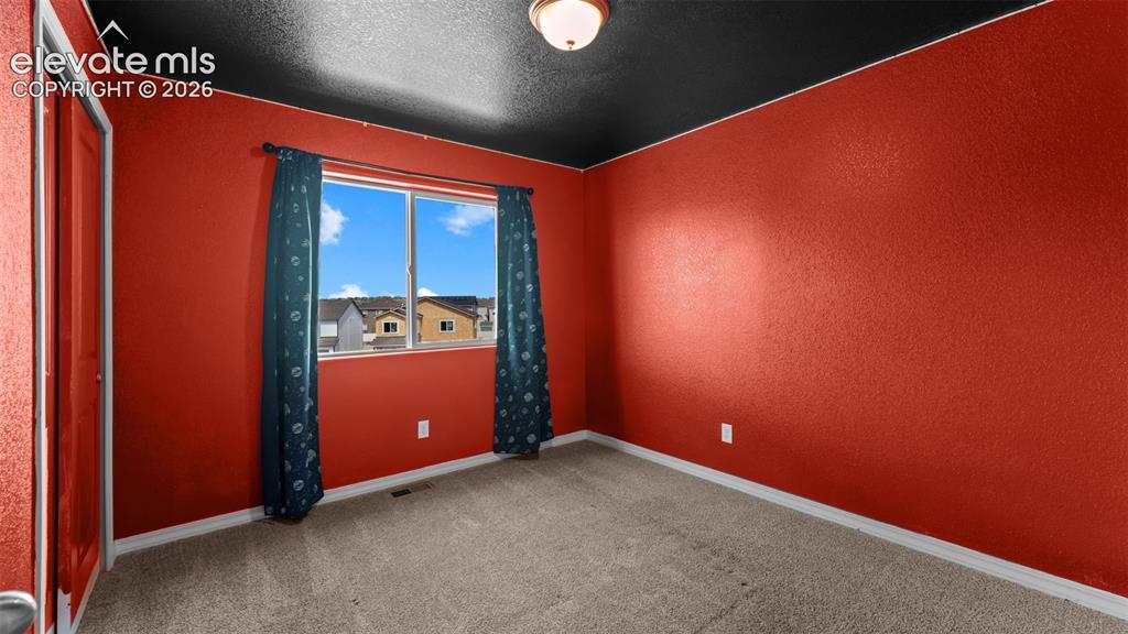 Image 21 of 29: Bedroom