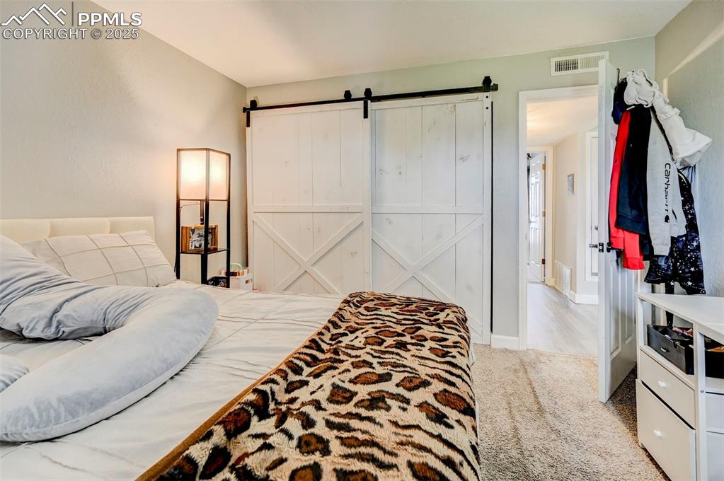 Image 12 of 26: Bedroom