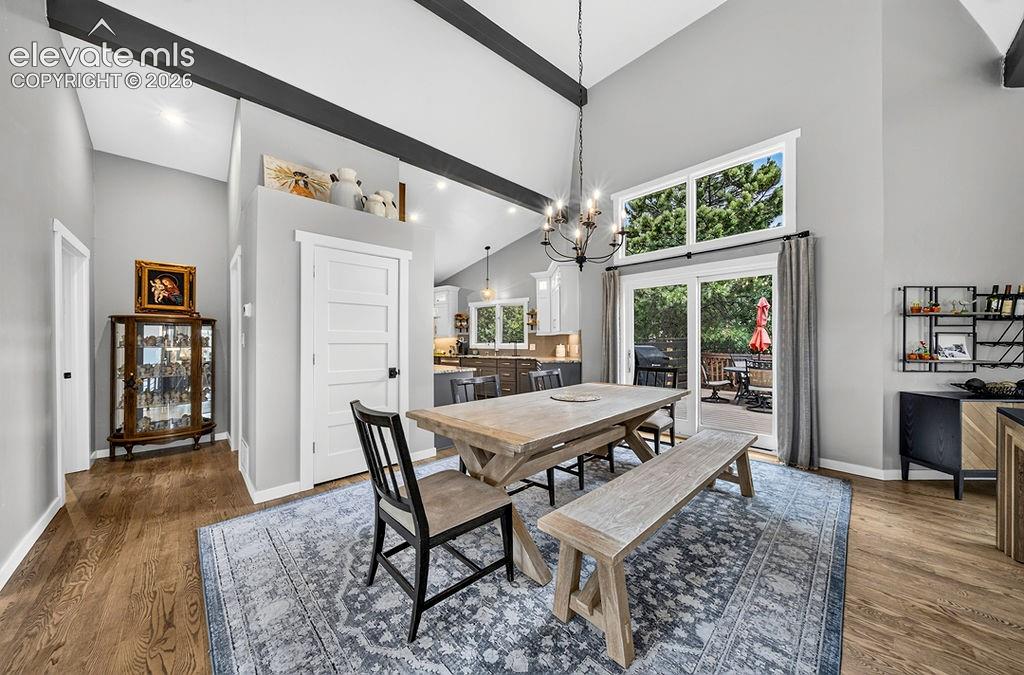 Image 14 of 50: Views and lush scenery from every glass door, window, and corner!
