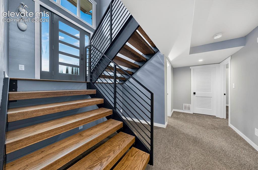 Image 31 of 50: Stairs to lower level