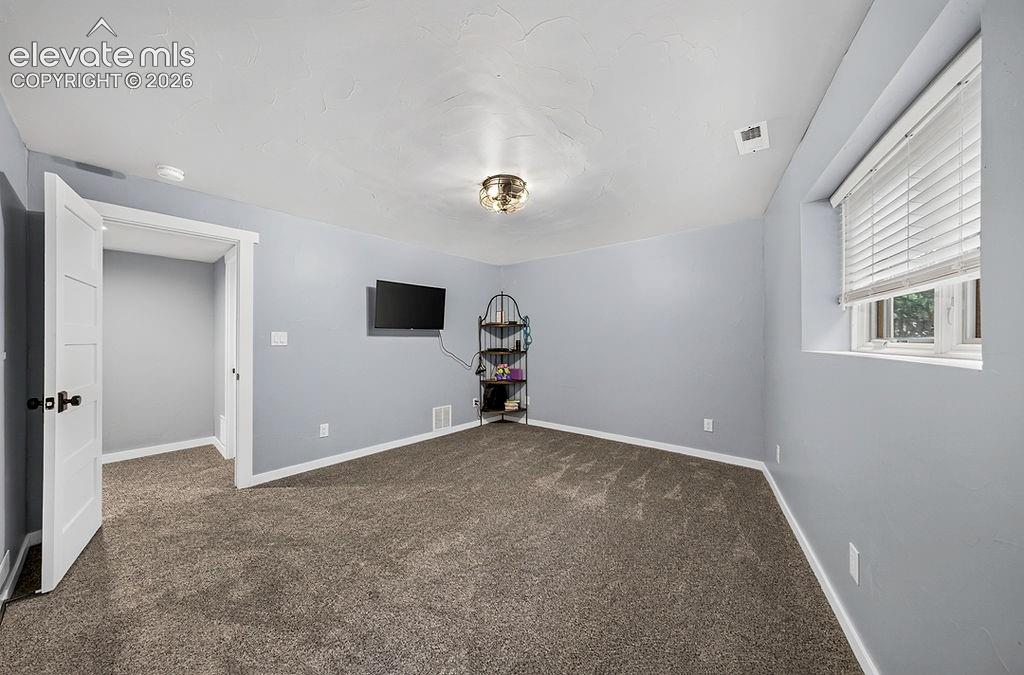Image 40 of 50: Lower level bedroom #4