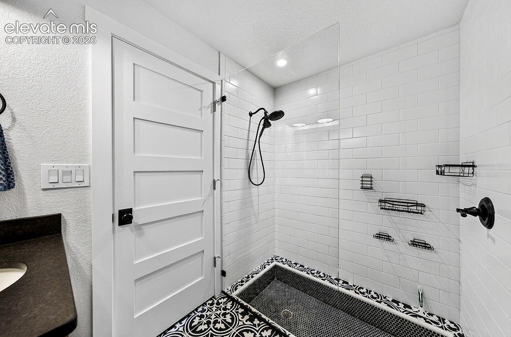 Image 41 of 50: Lower level 3/4 bathroom