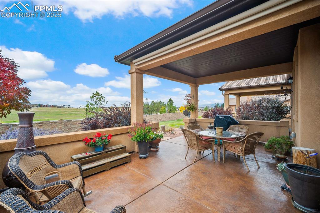 Image 4 of 39: View of patio / terrace with outdoor dining area