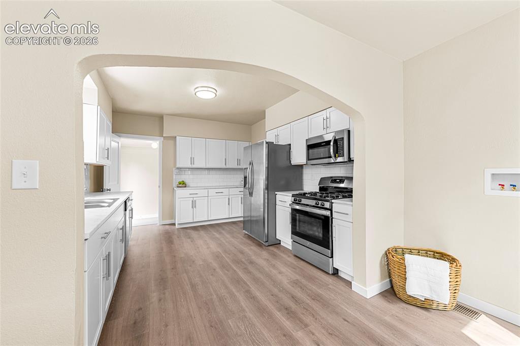 Image 4 of 32: Lower unit kitchen and dining room