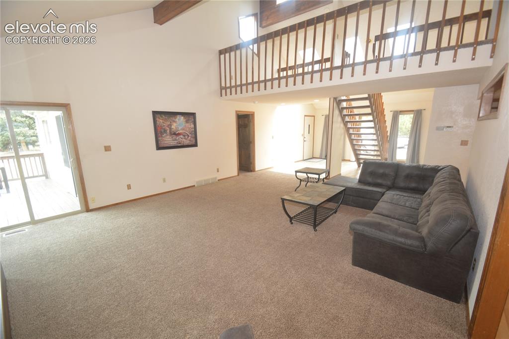 Image 13 of 45: view from dining room into living room