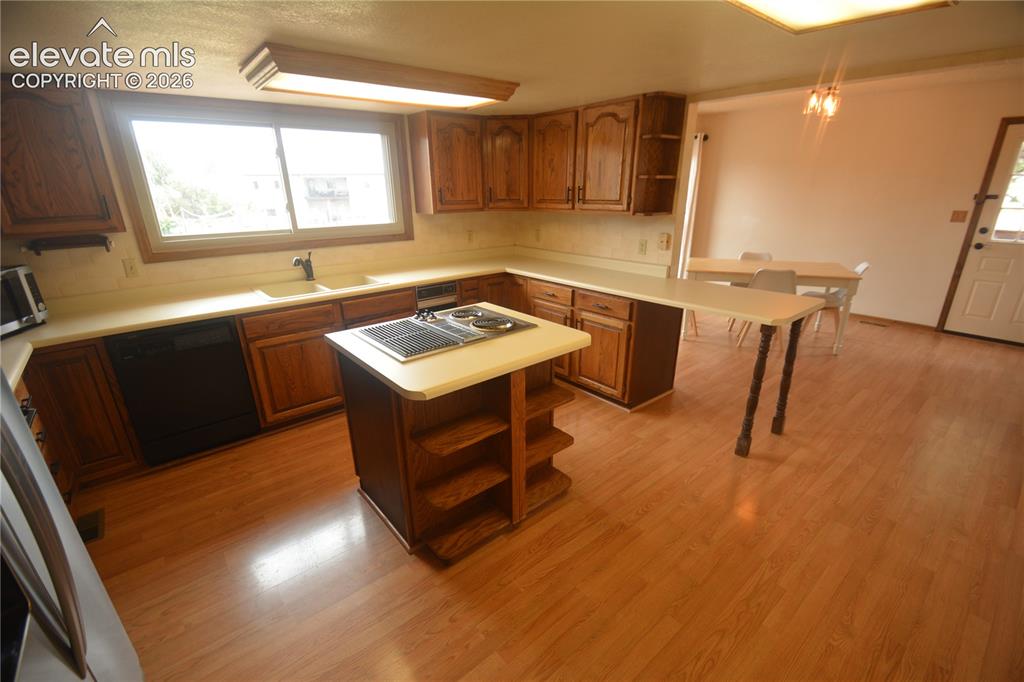 Image 19 of 45: view of kitchen and dining area