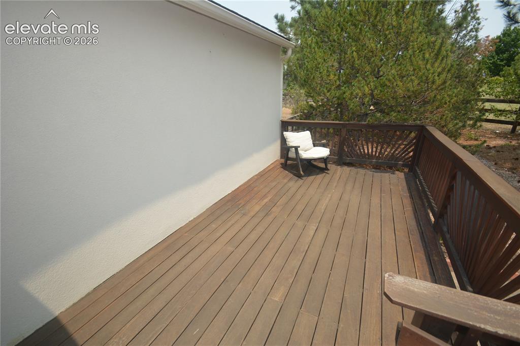 Image 6 of 45: 9x18 deck by front door