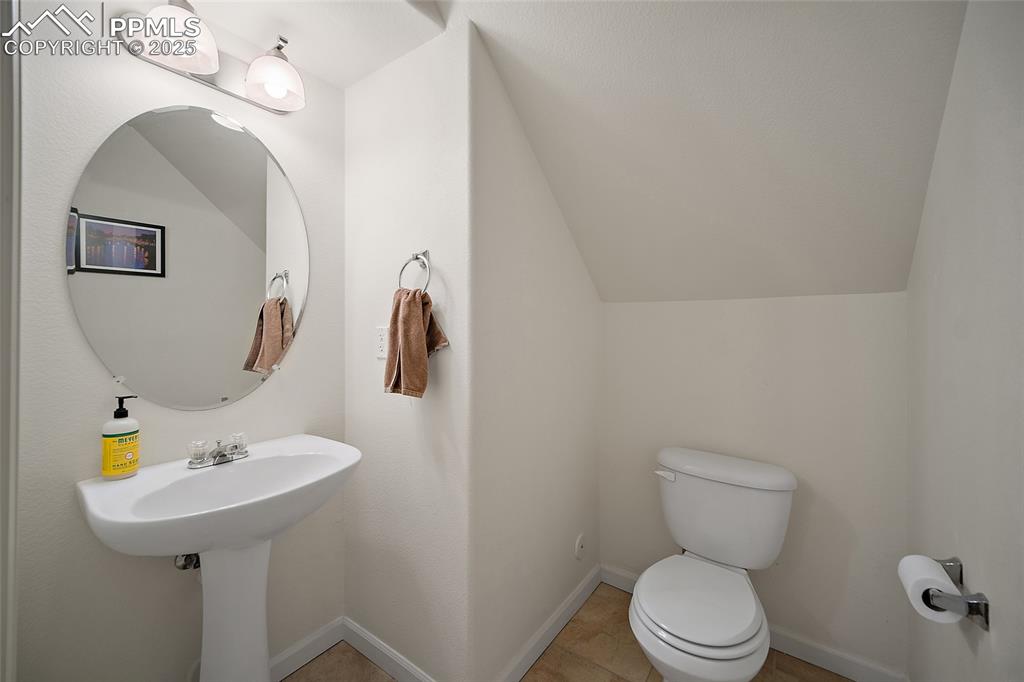 Image 17 of 37: Powder room on main level. 