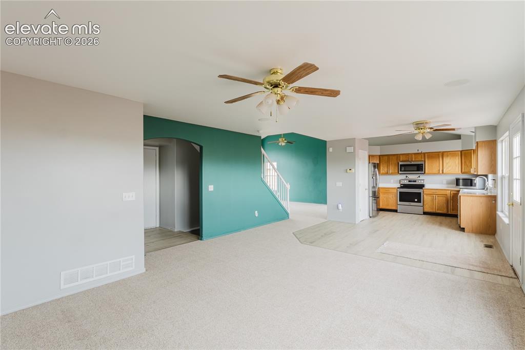 Image 12 of 39: Open Concept Kitchen/Dining/Living