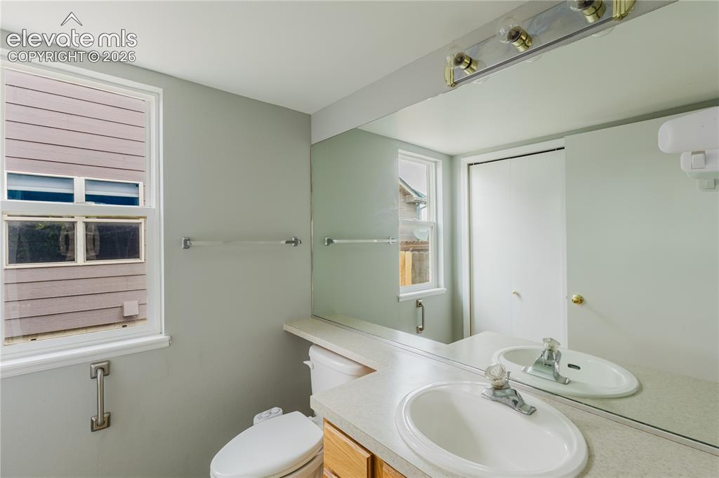 Image 13 of 39: Main level powder bath