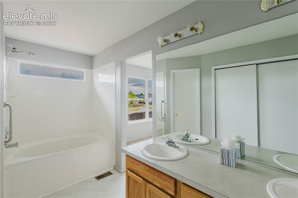 Image 18 of 39: Primary Bathroom