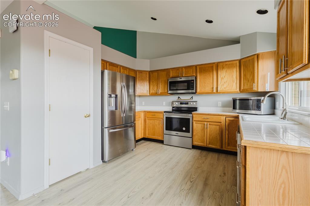 Image 8 of 39: Open Concept Kitchen/Dining/Living