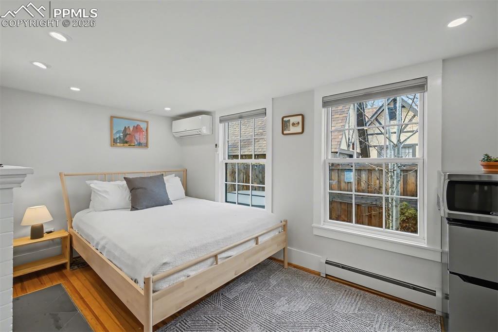 Image 12 of 43: Front bedroom with potential for short term rental income.