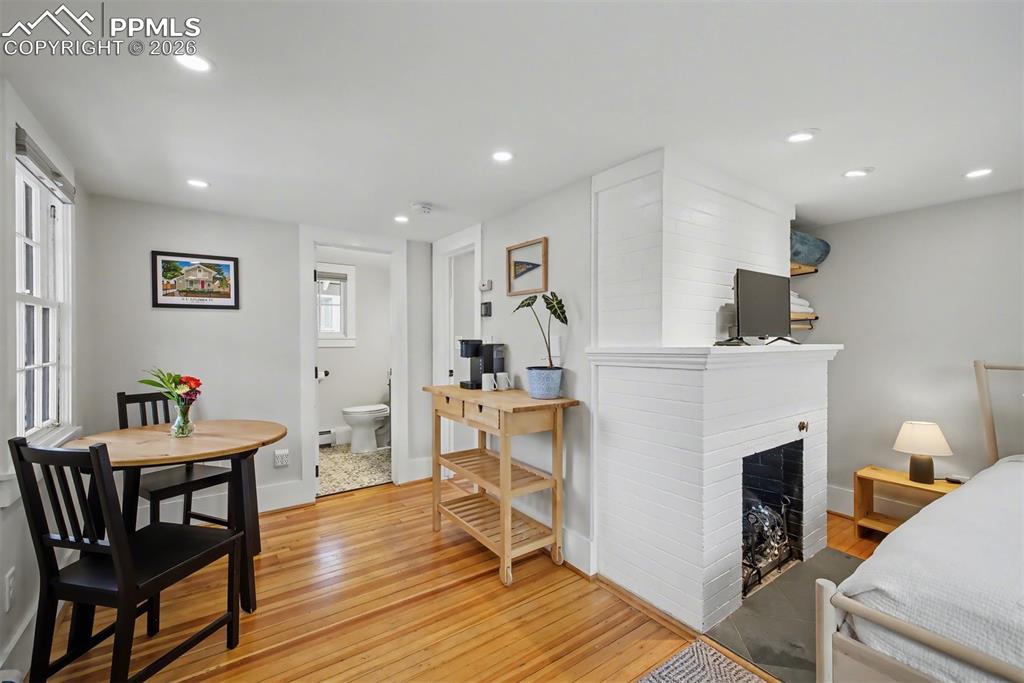 Image 13 of 43: Non-functioning decorative fireplace.