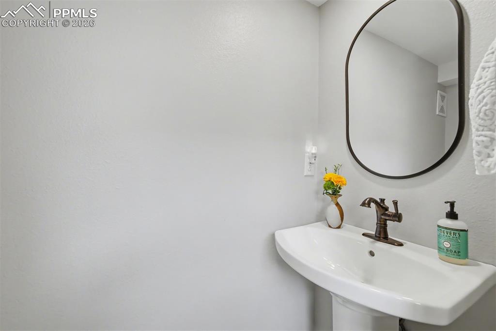 Image 15 of 43: Main level Powder room.