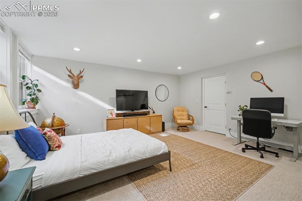 Image 30 of 43: Basement bedroom or home office.