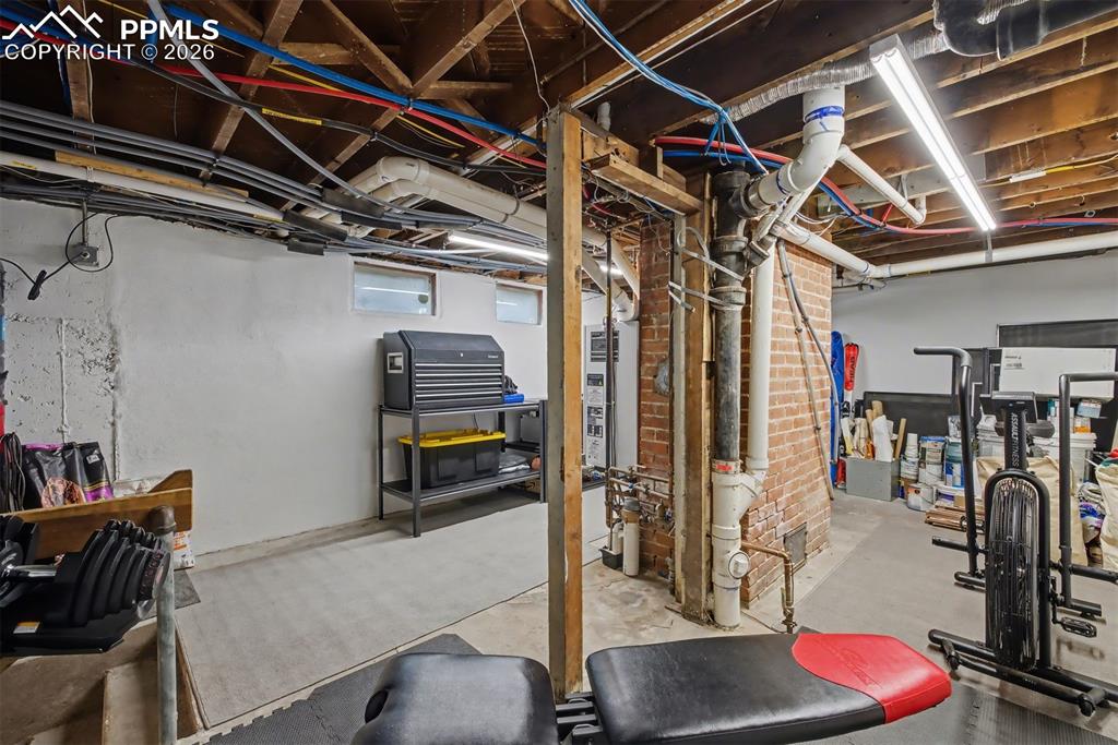 Image 34 of 43: Great storage space and room for some work out equipment.