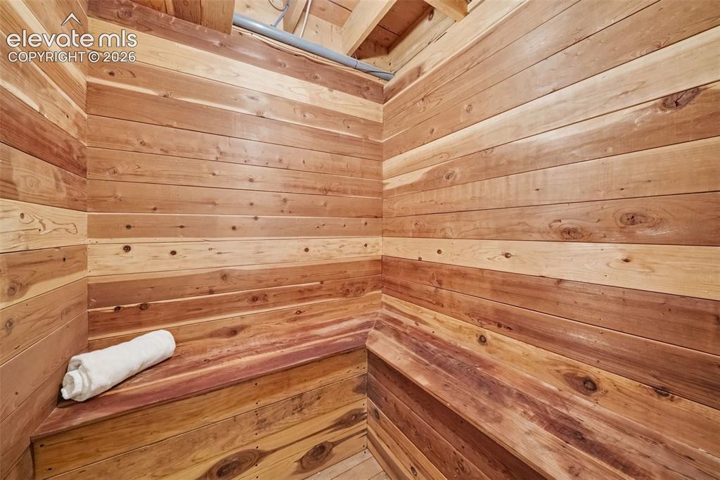 Image 24 of 44: Dry sauna adding a unique wellness retreat and extra versatility to the low