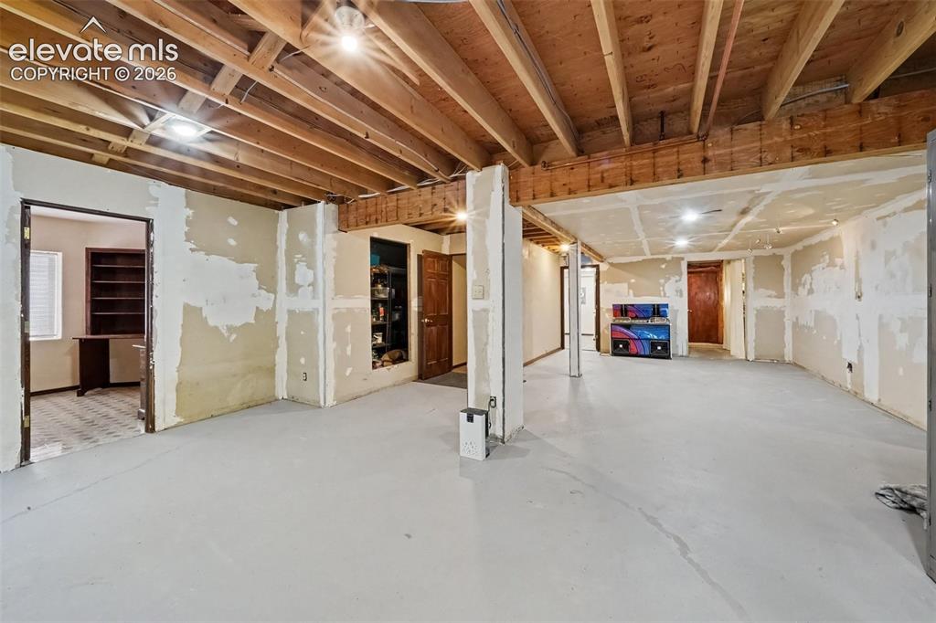 Image 29 of 44: Spacious basement area offers versatile space for recreation, hobbies, stor