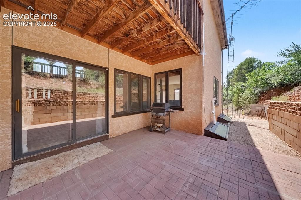 Image 30 of 44: Spacious patio with convenient walkout access from the living and dining ar