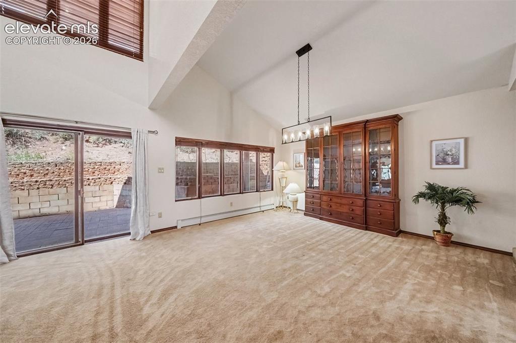 Image 6 of 44: Spacious dining and living room combination with plenty of room for enterta