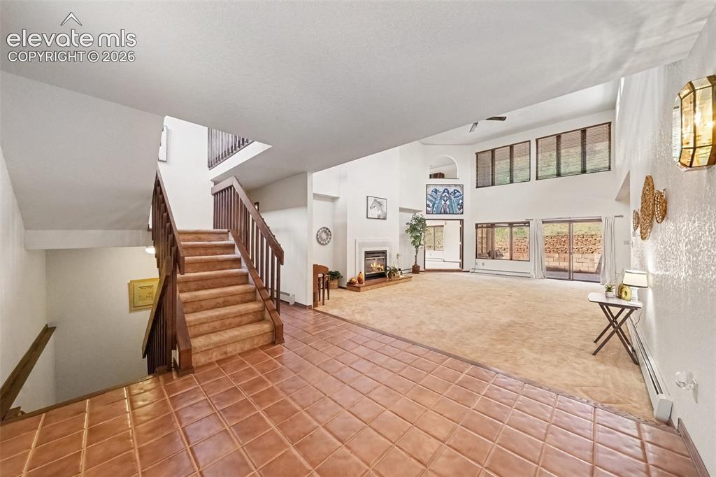 Image 7 of 44: Welcoming entrance foyer creates a beautiful first impression, offering an