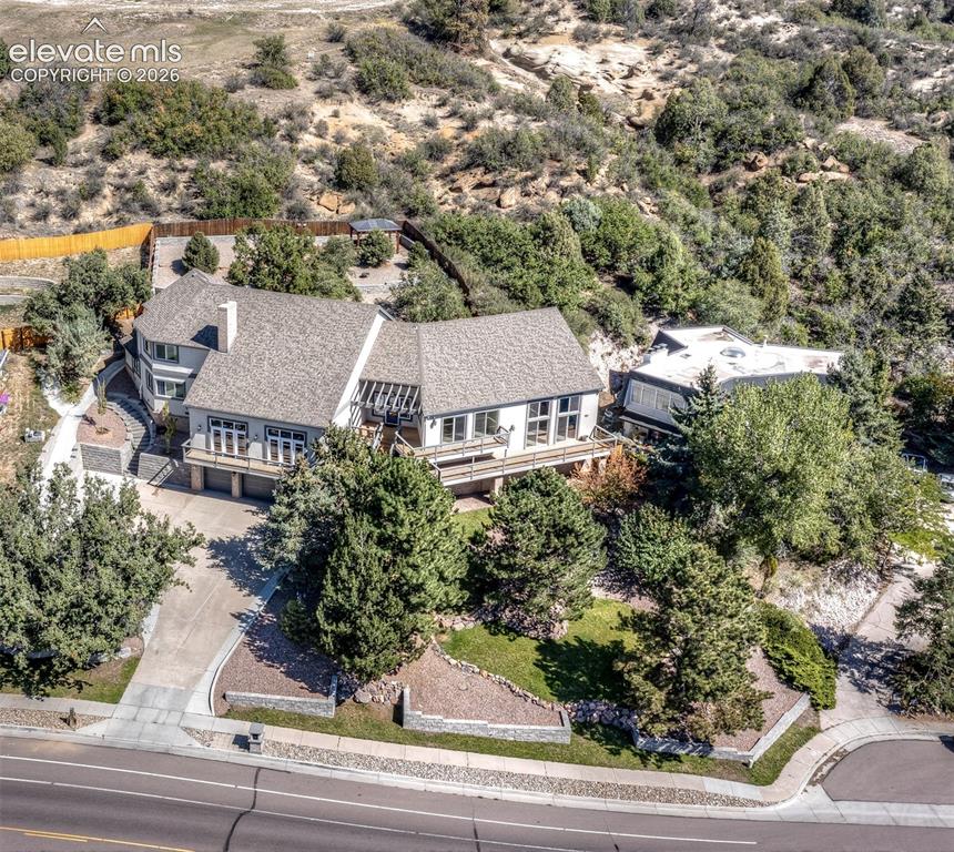 Caption: Front of the home from the drone up above