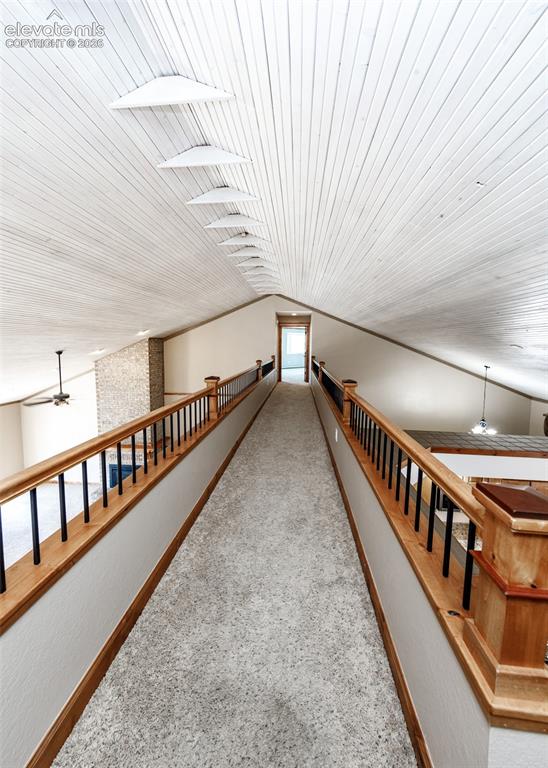 Image 16 of 50: Catwalk to Master bedroom
