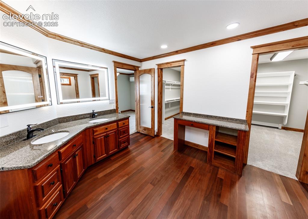 Image 21 of 50: Master bathroom with 2 very large closets