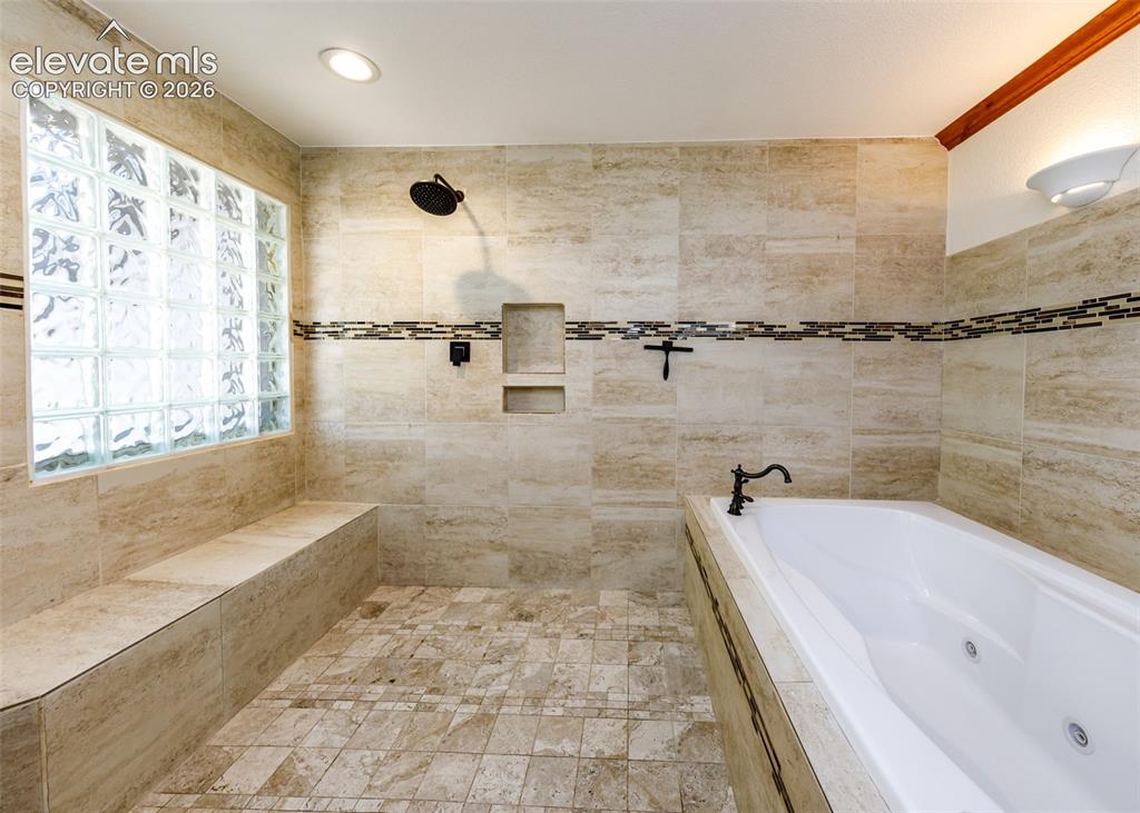Image 23 of 50: Master bathroom large soaking tub