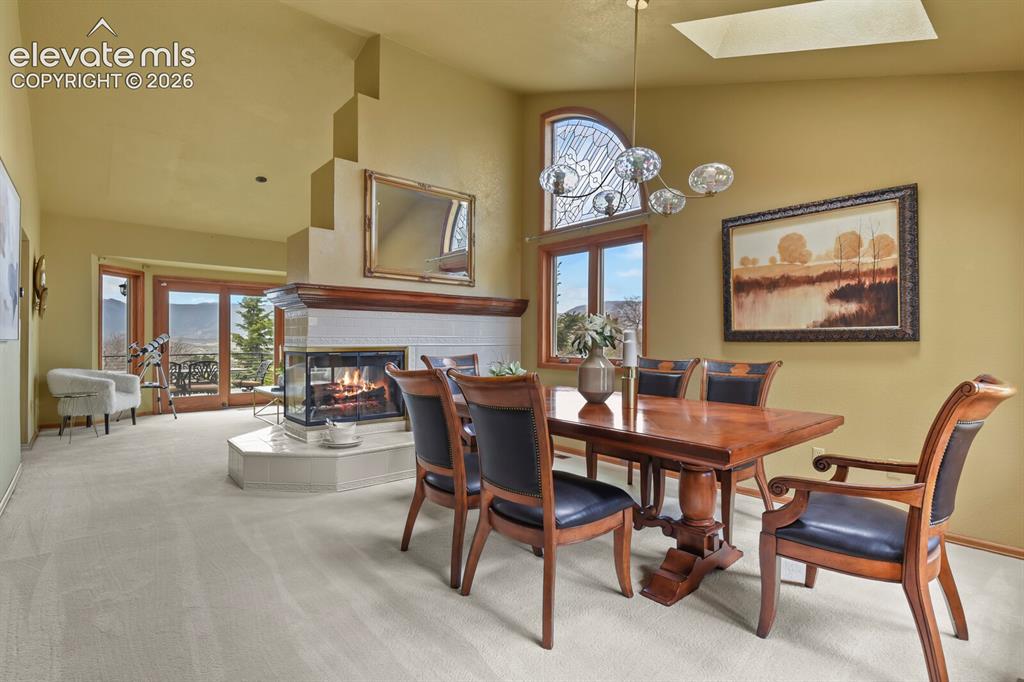 Image 15 of 41: A welcoming dining space perfect for gathering, with seamless access to the
