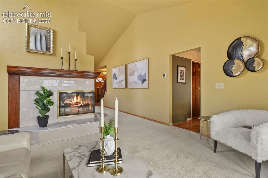 Image 17 of 41: Light-filled formal living room with an inviting, open feel—perfect for hos