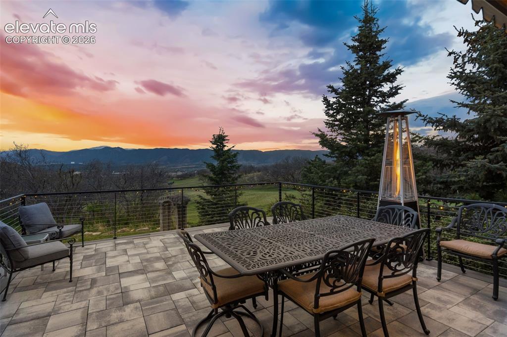 Image 3 of 41: Enjoy breathtaking mountain views from the brand-new stone deck, an ideal s