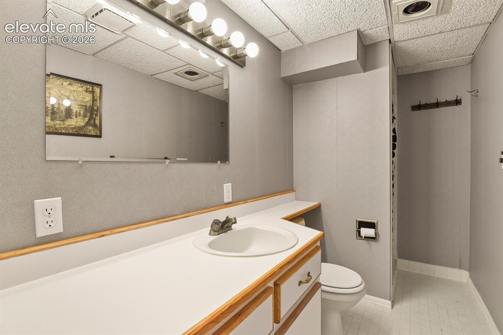 Image 32 of 41: Additional lower-level full bath adds convenience and flexibility for guest