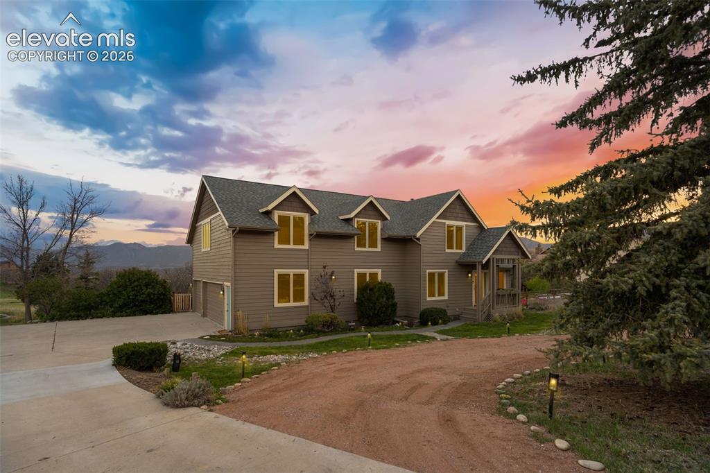 Image 41 of 41: Beautifully set among mature trees on a quiet cul-de-sac, this Woodmoor hom