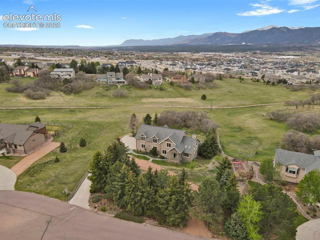 Image 5 of 41: Expanded aerial view showcasing the balance of privacy, open space, and nei