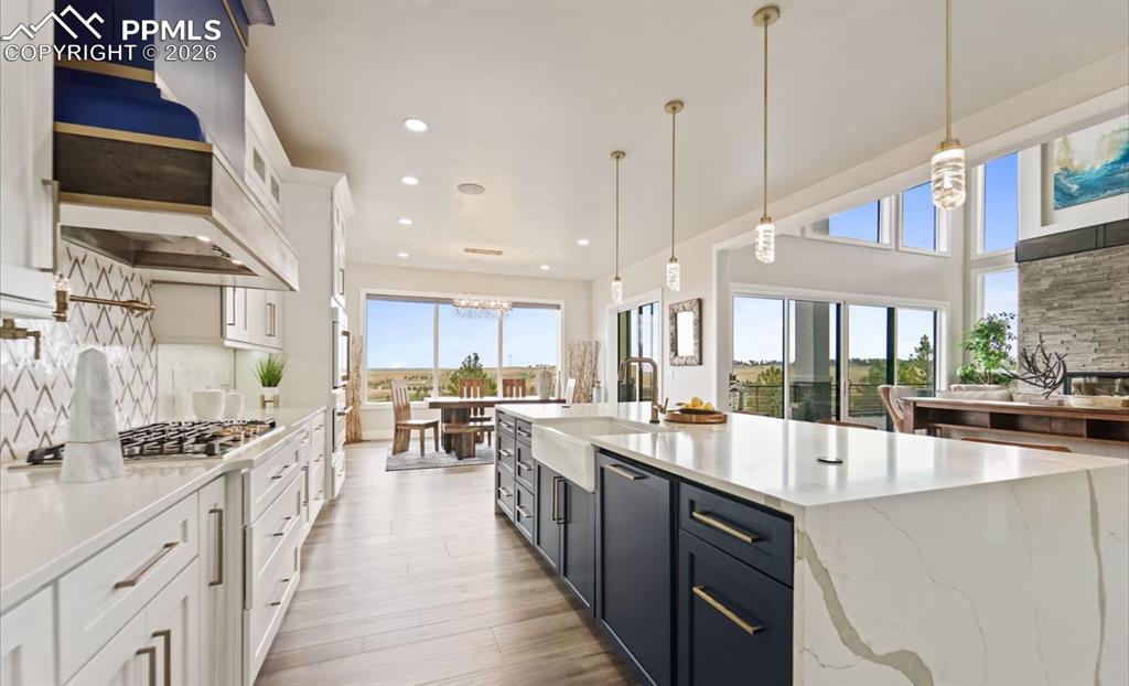 Image 12 of 50: As added luxury, this home boosts quartz and granite window seals throughou