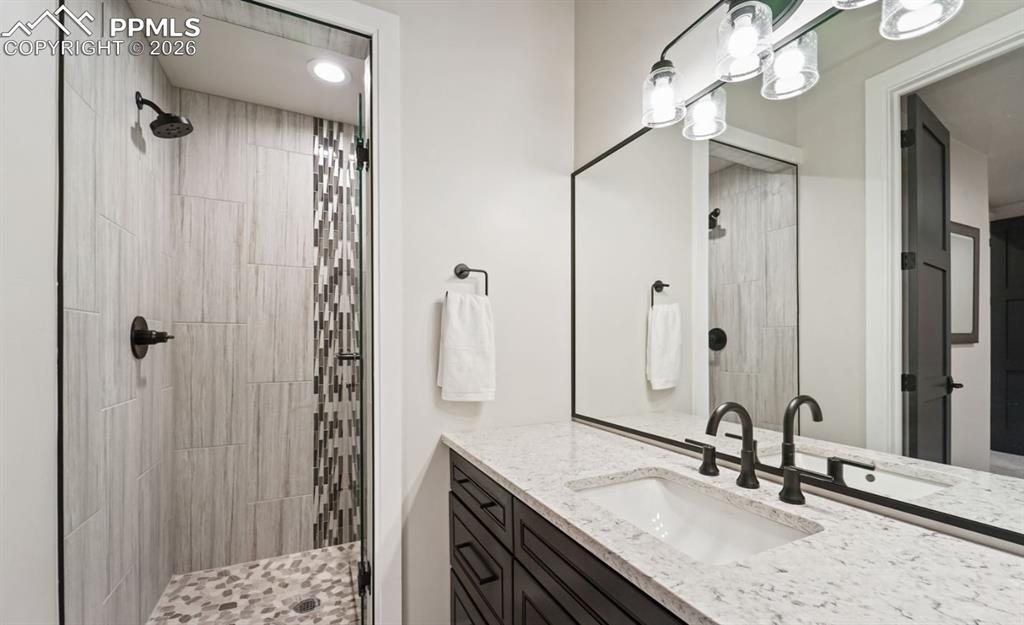 Image 35 of 50: 3/4 private bathroom. 