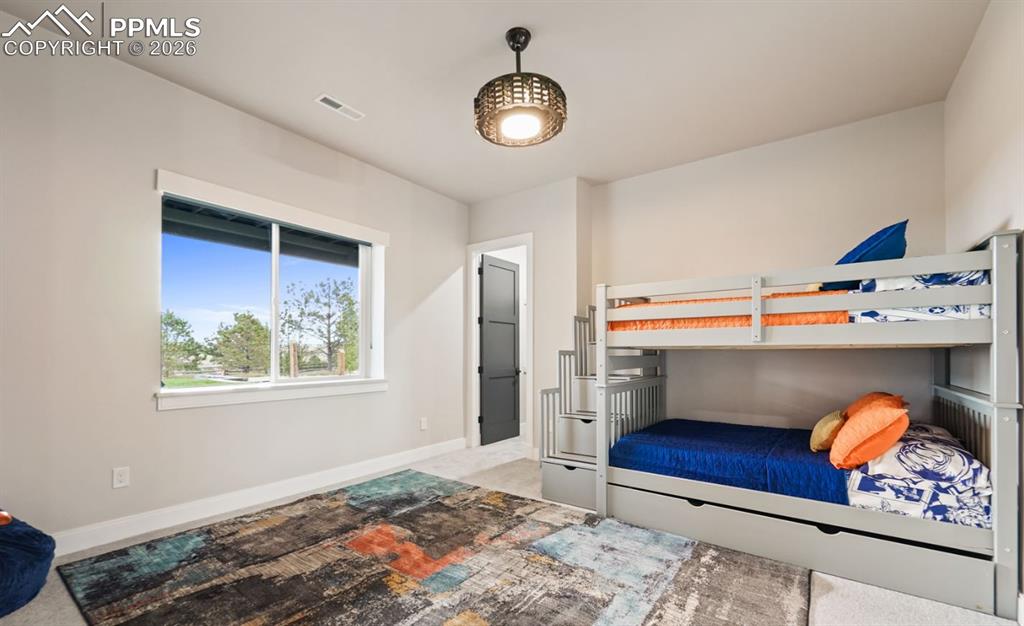 Image 36 of 50: Second Jr suite is garden level, with another walk-in closet and private 3/