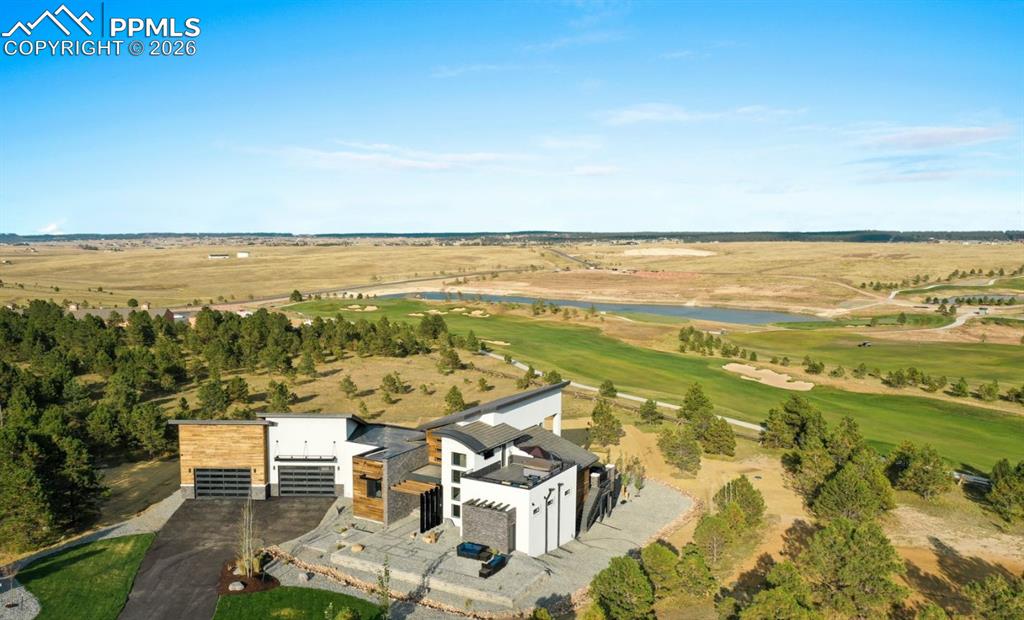Image 42 of 50: This luxury home rests on 2.51 acres backing the Flying Horse North Golf Co