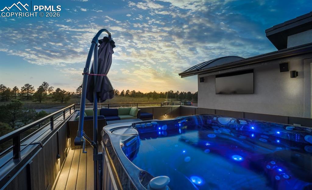Image 48 of 50: Hot tub included. System is wired for an outdoor TV as well. 