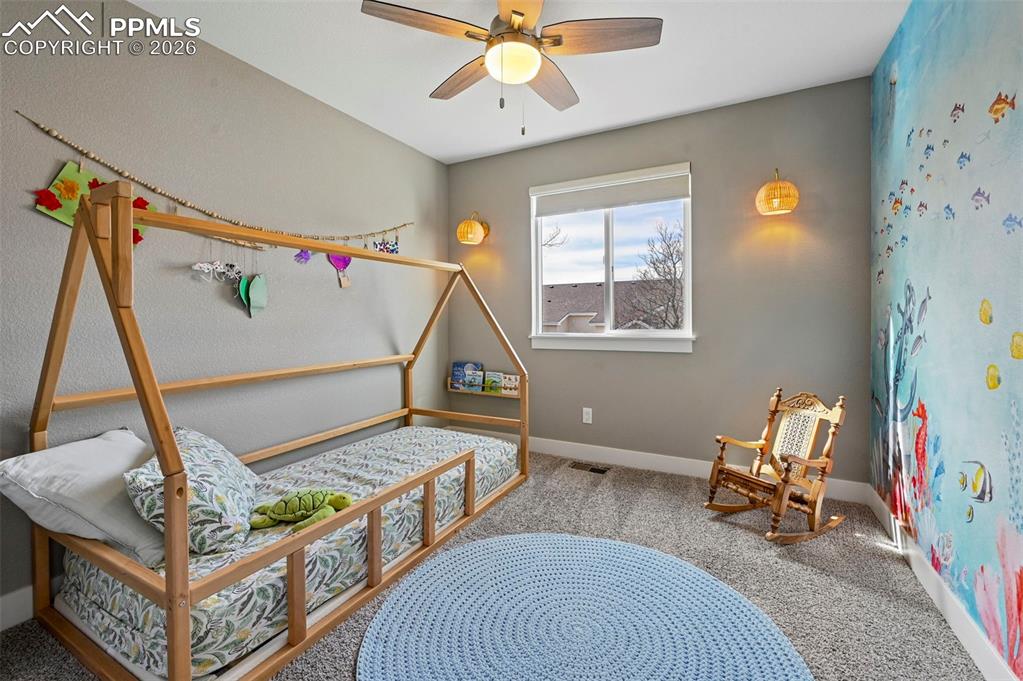 Image 23 of 34: Upper Level Bedroom