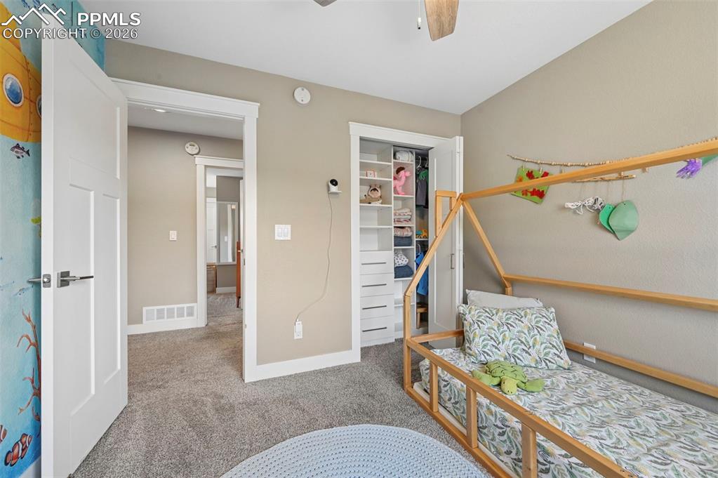 Image 24 of 34: Upper Level Bedroom